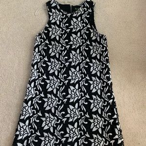 Beautiful printed dress with fun back cut outs!